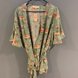 Adorable floral, wrap blouse